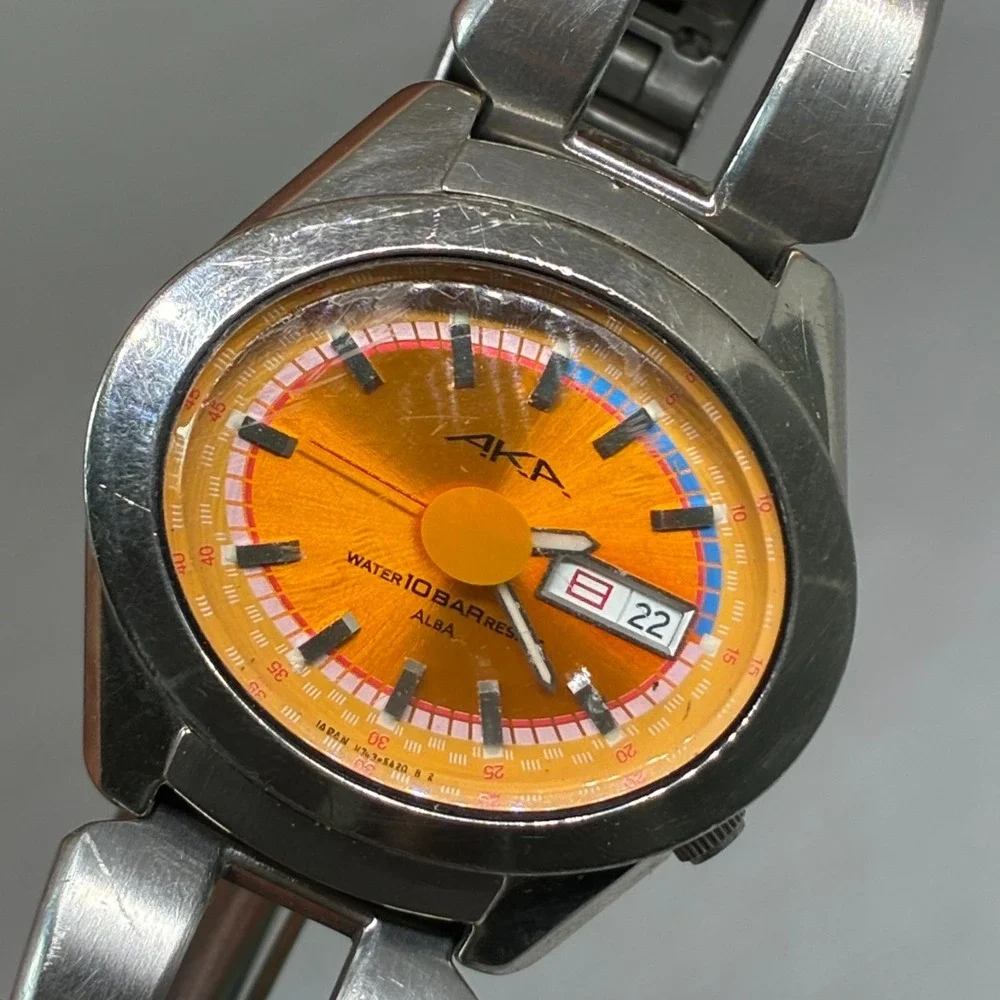 Vintage Seiko Alba AKA V743-5A10 Men's Quartz Watch Orange Dial 10BAR